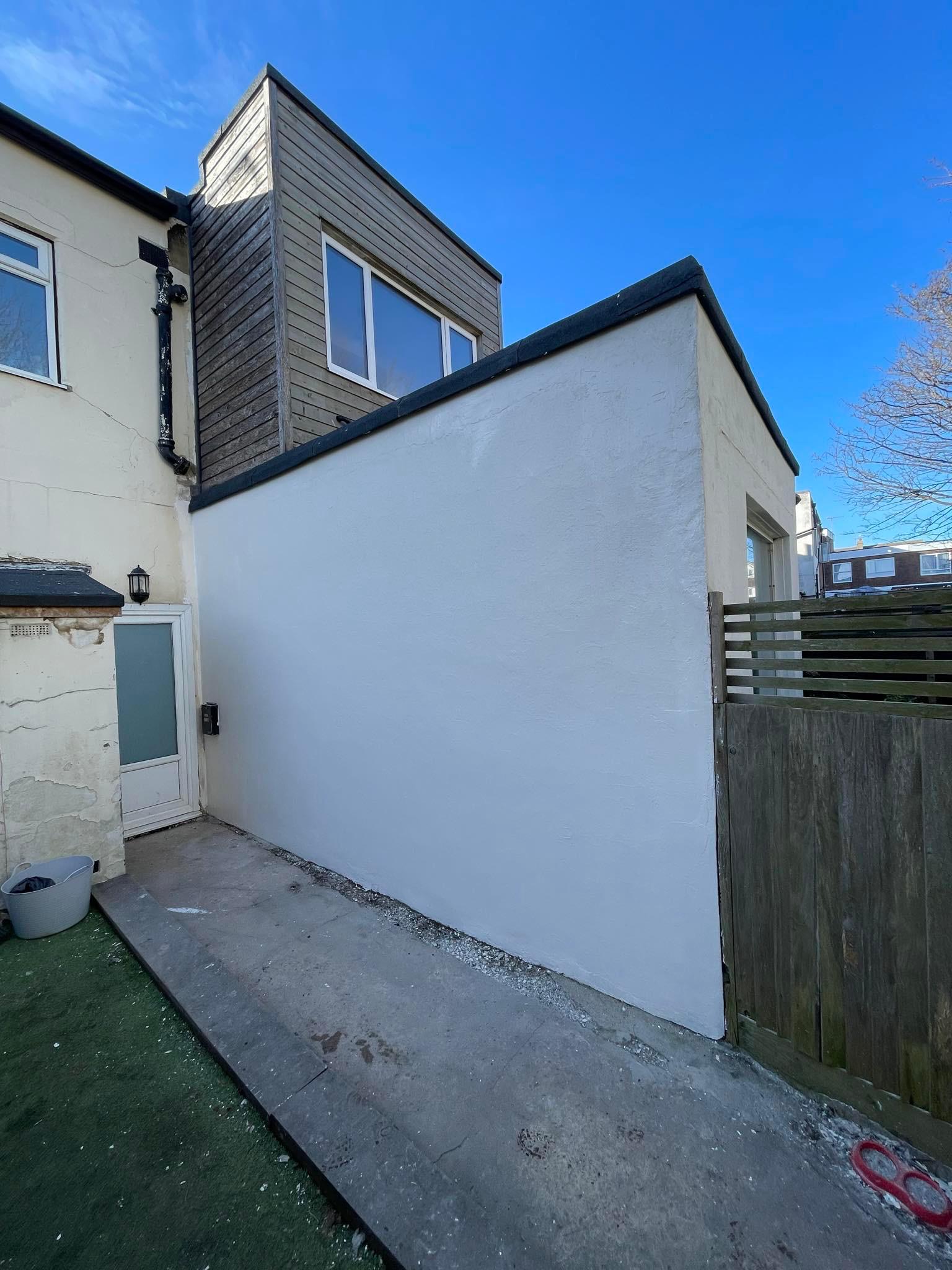 Freshly rendered and painted exterior wall