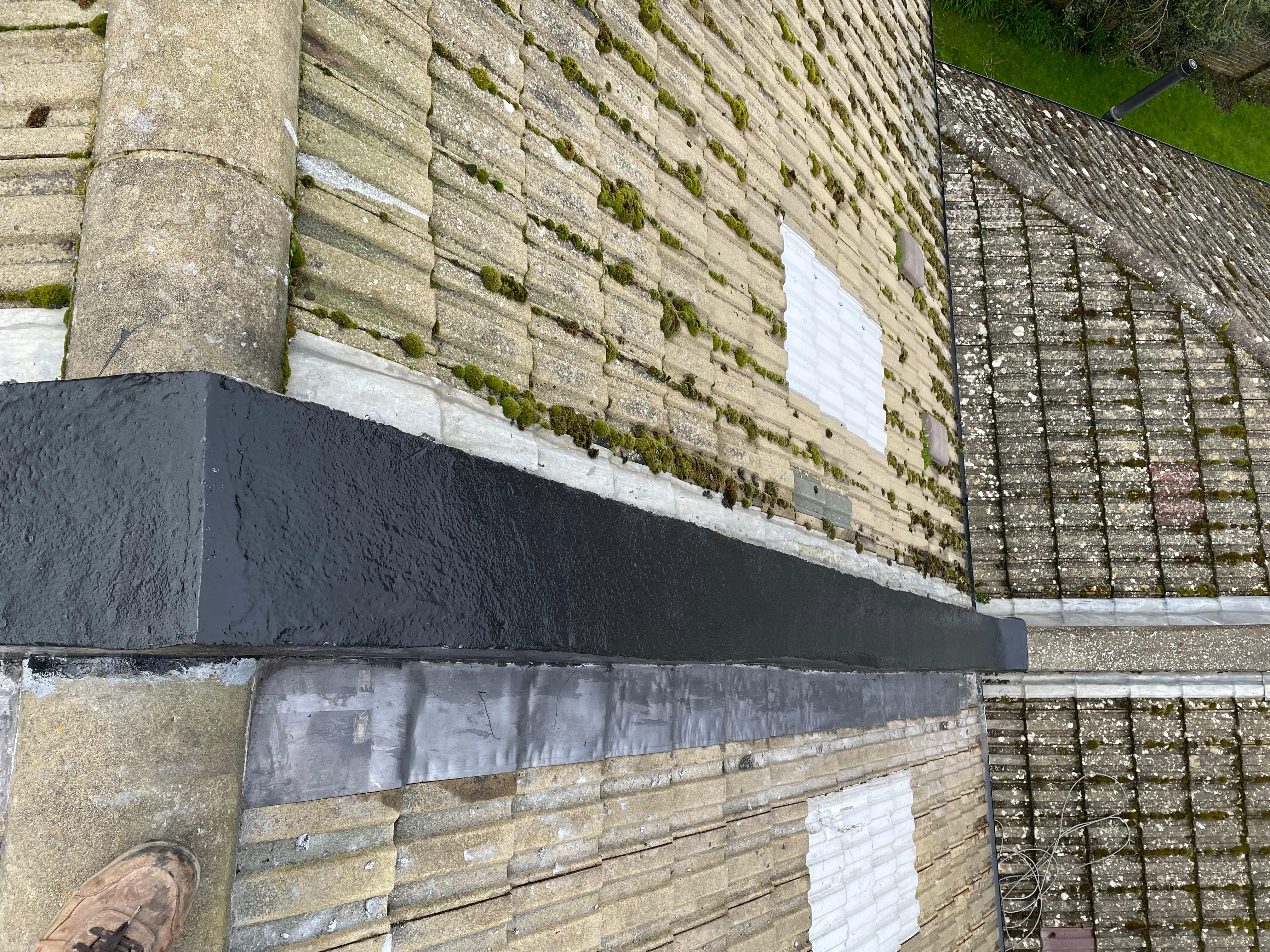 Repaired roof valley with new lead flashing